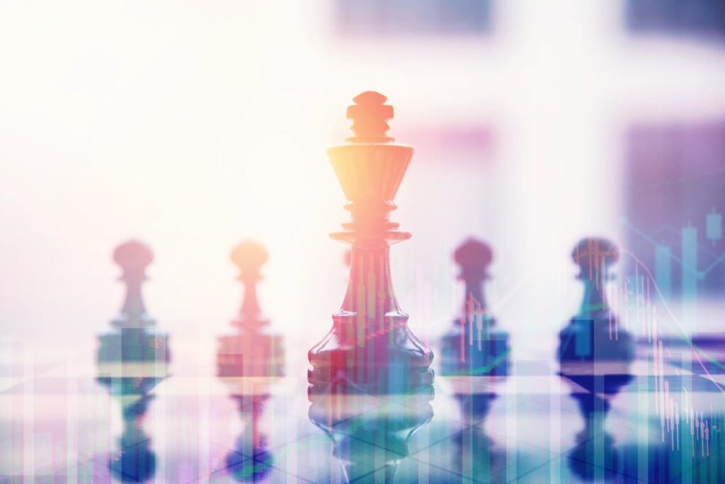 The image displays a colorful chessboard with a center leader and two pawns.