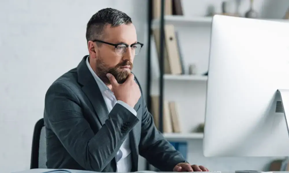 SMB owner reading about Windows 10 security risks past the end of support.