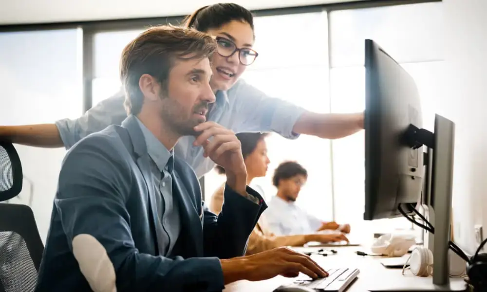 A supervisor explains internal I.T. policies to a new employee