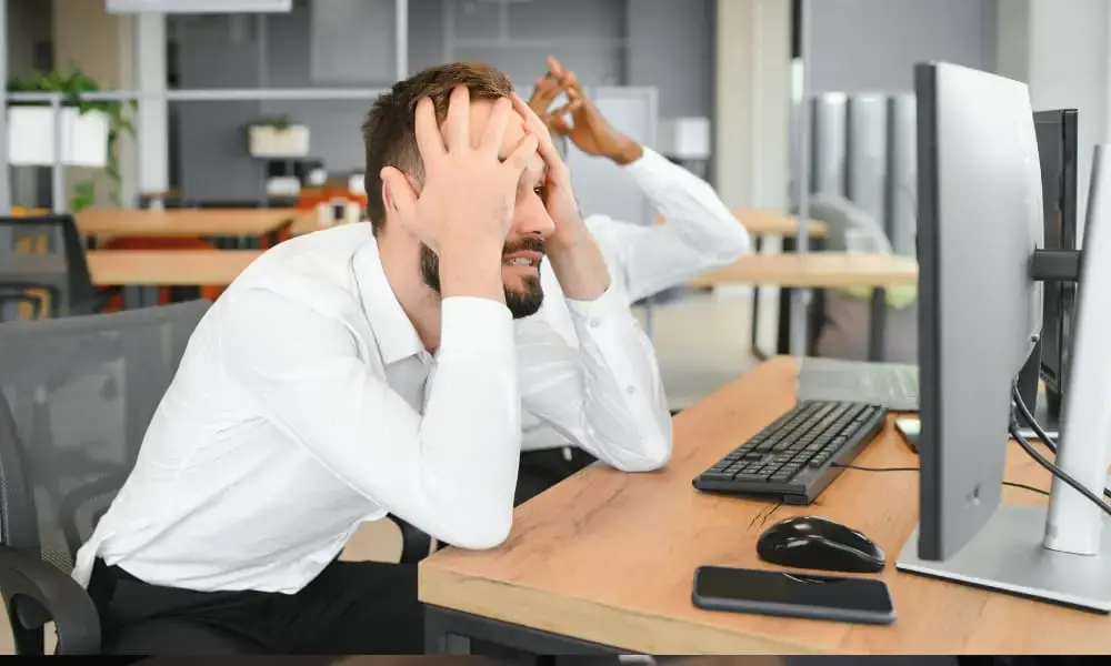 SMB owner frustrated because they neglected I.T. outage preparedness and business continuity planning.