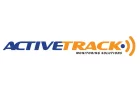 Logo of Active Track Monitoring Solutions. The text "ACTIVETRACK" spans across the image with "ACTIVE" in blue and "TRACK" in orange. On the right side, there are three orange curved lines, resembling signal waves. Below the word "TRACK," the text "MONITORING SOLUTIONS" appears in black.